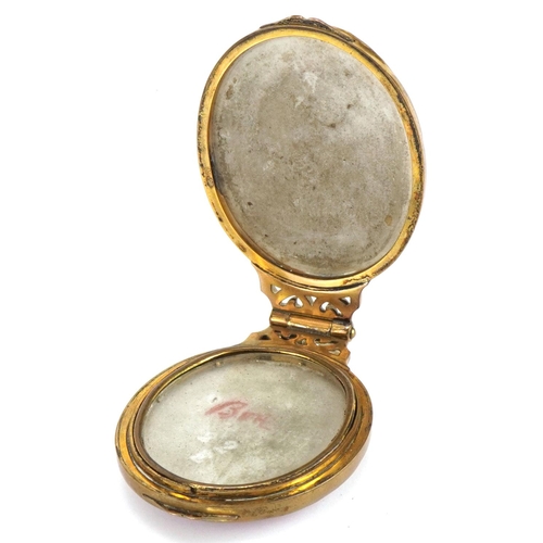 221 - 19th century Continental brass locket with two porcelain panels hand painted with 18th century port ... 