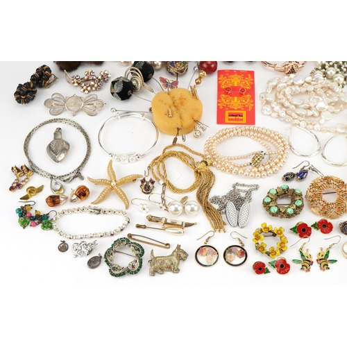 3722 - Vintage and later costume jewellery and hatpins, some silver, including jewelled brooches, Middle Ea... 