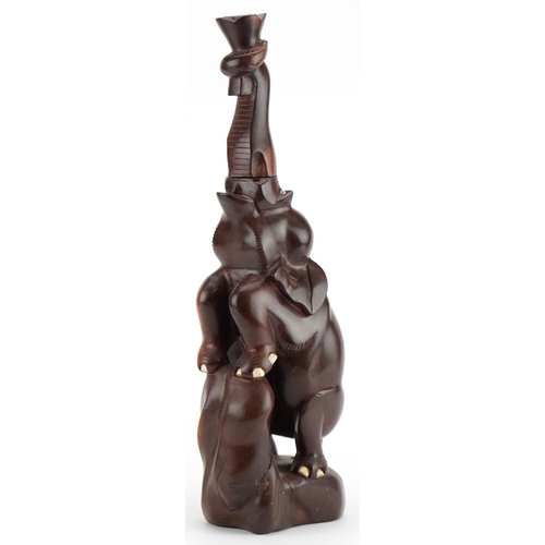 2449 - African hardwood carved hardwood table lamp in the form of an elephant, 49cm high