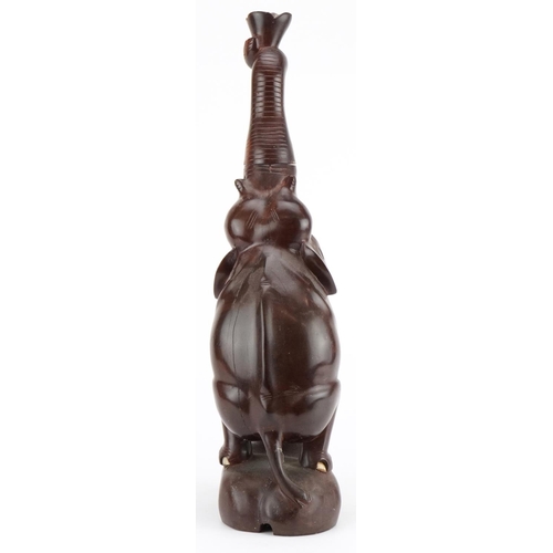 2449 - African hardwood carved hardwood table lamp in the form of an elephant, 49cm high