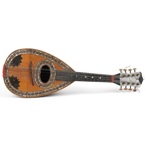 1011 - Italian inlaid melon shaped mandolin with mother of pearl and tortoiseshell inlay, bearing an Regina... 