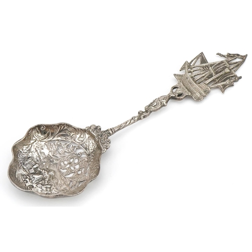 324 - Dutch silver sifting spoon, the bowl embossed with a young farm girl with mermaid and rigged sailing... 