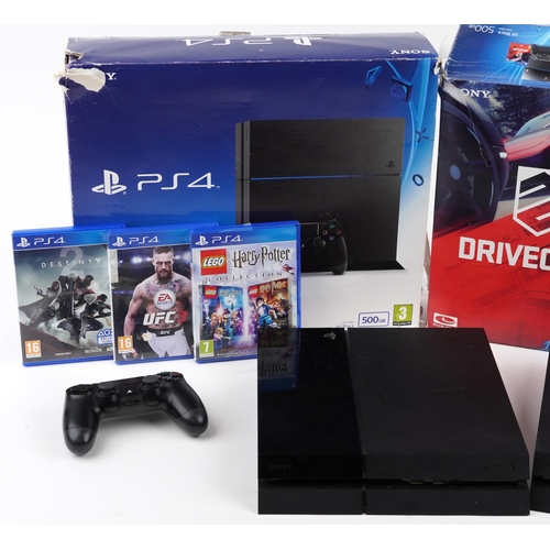 1208 - Two Sony PlayStation 4 consoles with boxes and three games comprising UFC 3, Destiny 2 and Harry Pot... 