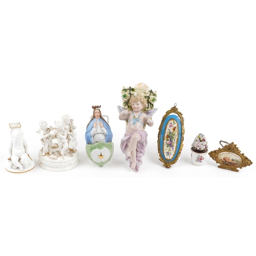 250 - 19th century and later porcelain including a spill vase in the form of Putti with bow and arrow, ova... 