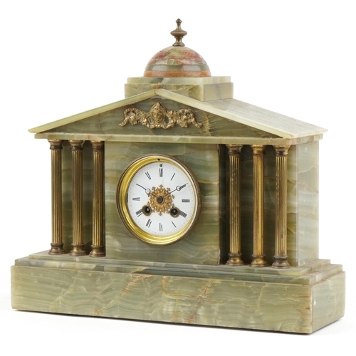 2447 - Onyx architectural mantle clock striking on a bell with reeded columns and circular dial having Roma... 