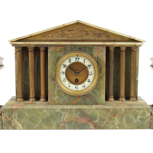 698 - Gustav Becker, German onyx architectural mantle clock with figural garnitures and enamelled chapter ... 