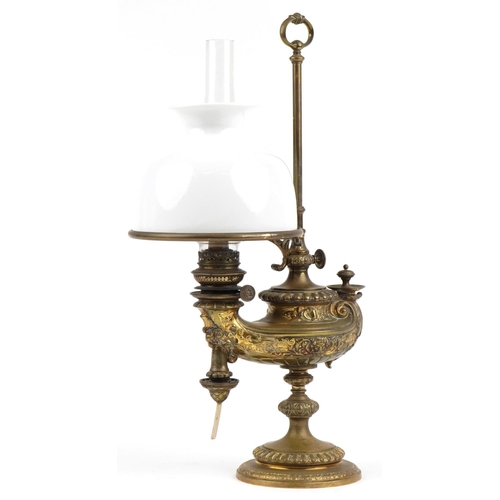 Wild & Wessel of Berlin, 19th century German adjustable brass studen oil lamp with white opaque glass shade in the form of an Aladdin's lamp, 56cm high