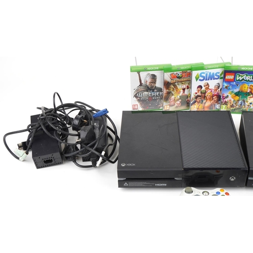 1211 - Two Microsoft Xbox 1 games consoles with various controllers and games including Worms and Minecraft