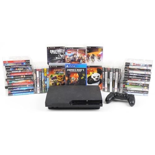 1215 - Sony PlayStation 3 games console with controller and a collection of games