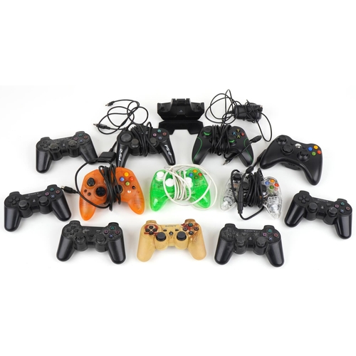 1223 - Various games console controllers including Sony PlayStation and Microsoft Xbox