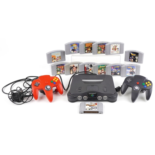 1222 - Vintage Nintendo 64 games console with two controllers and various games including Banjo-Kazooie, Ja... 