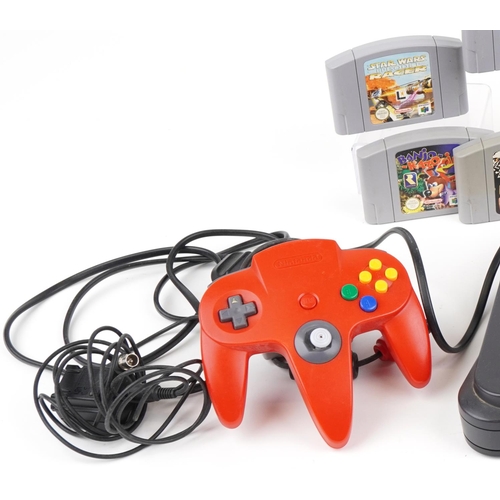 1222 - Vintage Nintendo 64 games console with two controllers and various games including Banjo-Kazooie, Ja... 