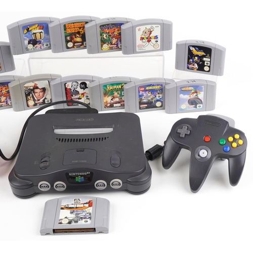 1222 - Vintage Nintendo 64 games console with two controllers and various games including Banjo-Kazooie, Ja... 