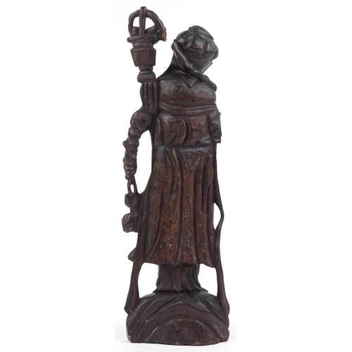 2628 - Chinese carved hardwood figure with white metal inlay, 42cm high