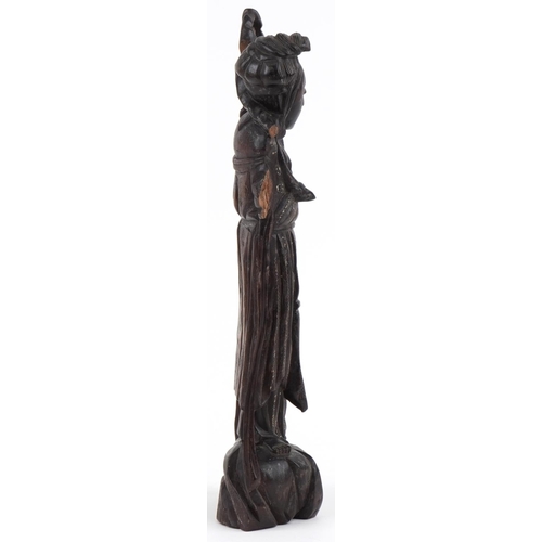 2628 - Chinese carved hardwood figure with white metal inlay, 42cm high