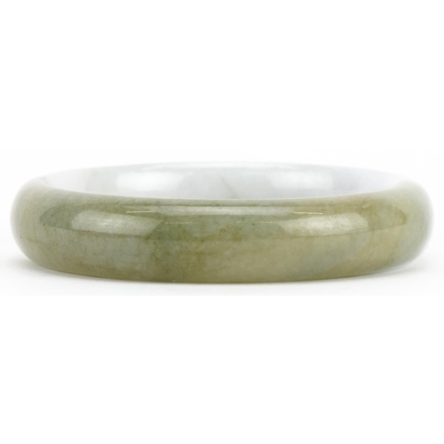 3485 - Chinese green and white jade bangle, 7.5cm in diameter