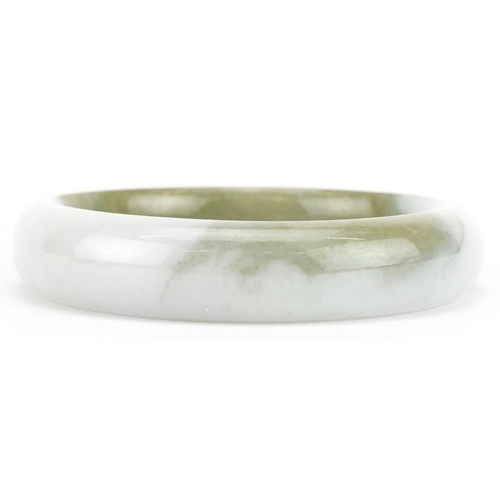 3485 - Chinese green and white jade bangle, 7.5cm in diameter