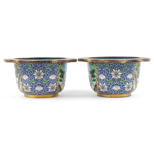 27 - Good pair of Chinese cloisonne planters enamelled with panels of cranes within a border of flowers, ... 