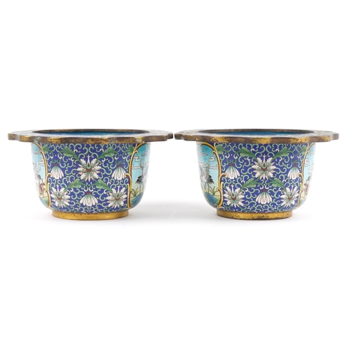 27 - Good pair of Chinese cloisonne planters enamelled with panels of cranes within a border of flowers, ... 