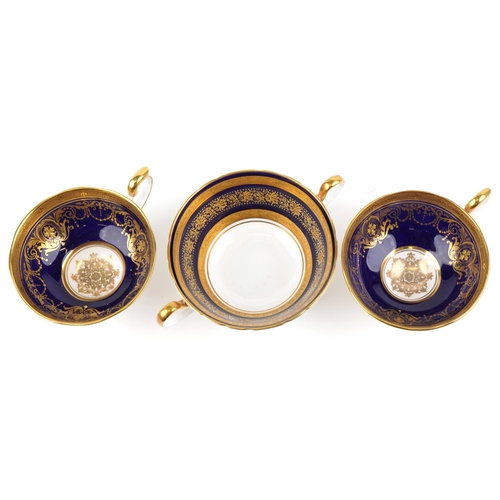 349 - Aynsley Kenilworth cobalt blue ground soup cup with saucer and two similar teacups with saucers, eac... 