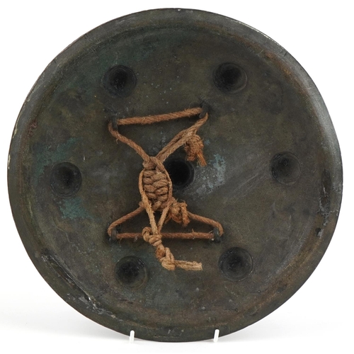 94 - Indo-Persian bronze Dhal shield with star motifs, 31.5cm in diameter