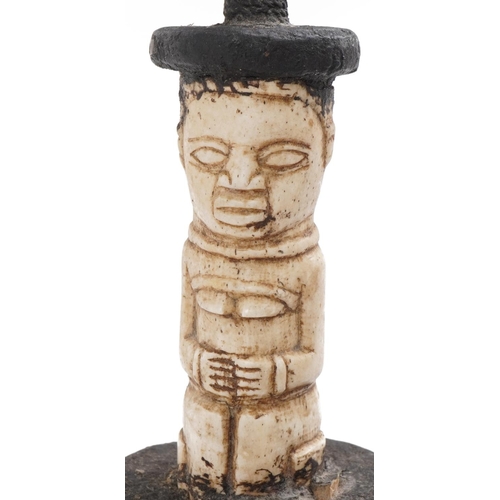 416 - African tribal interest smoking pipe with carved bone figural mounts, 38cm in length