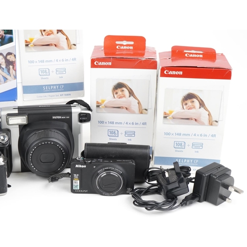 1065 - Vintage and later cameras and accessories, some with boxes including Nikon F65, Canon Selphy CPA100,... 