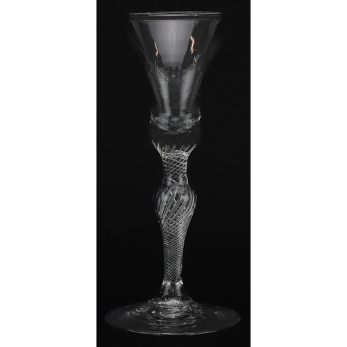 262 - 18th century wine glass with air twist stem and bell shaped bowl, 17.5cm high