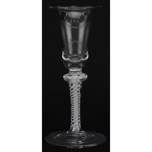 258 - 18th century wine glass with multiple opaque air twist stem and trumpet bowl, 16cm high