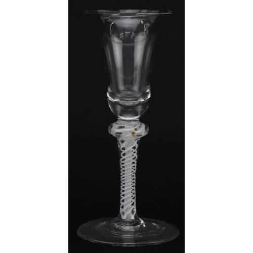 258 - 18th century wine glass with multiple opaque air twist stem and trumpet bowl, 16cm high