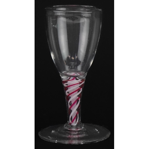 56 - 18th century cordial glass with multiple red and white opaque twist stem, 11.5cm high