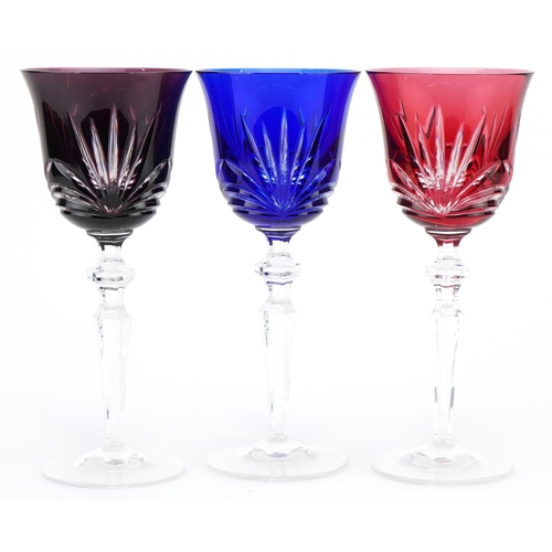 2299 - Three good quality Bohemian overlaid wine glasses, 21.5cm high