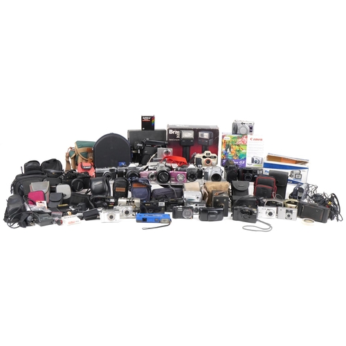 1058 - Vintage and later cameras and accessories including Praktica MTL5B, Lumix, Minolta, Canon AE-1 and F... 