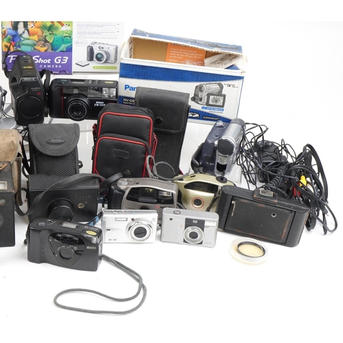 1058 - Vintage and later cameras and accessories including Praktica MTL5B, Lumix, Minolta, Canon AE-1 and F... 