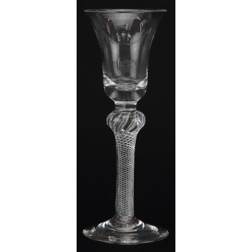 260 - 18th century wine glass with air twist stem and bell shaped bowl, 15.5cm high