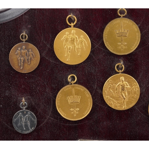 1404 - Collection of military interest athletics medals relating to Sergeant Thomas Barry arranged in a mah... 