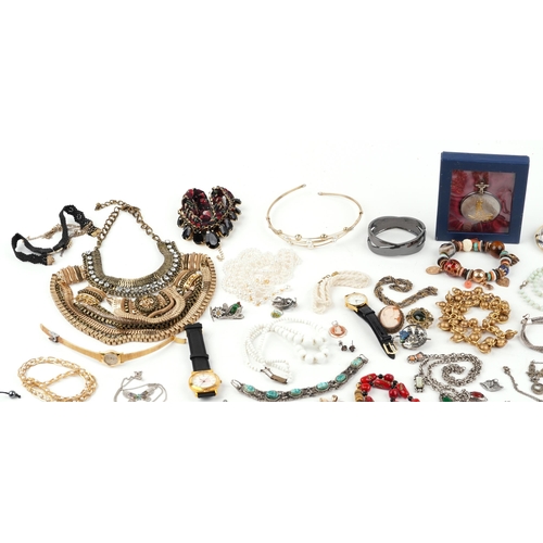 3735 - Vintage and later costume jewellery including necklaces, jewelled brooches, Lorus wristwatch, Middle... 