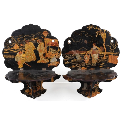 701 - Black lacquered and papier mache chinoiserie sundry items comprising a pair of folding wall brackets... 