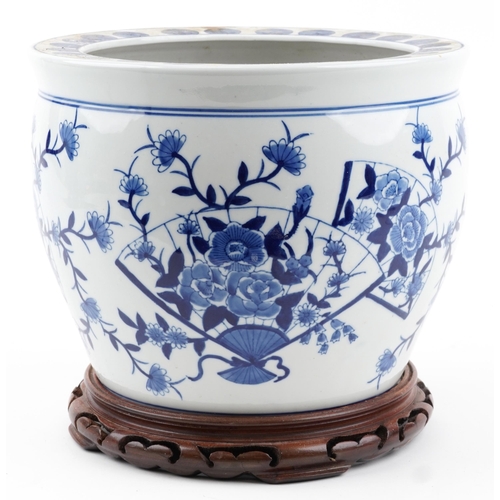 2439 - Chinese blue and white porcelain jardiniere on hardwood stand hand painted with flowers and fan moti... 