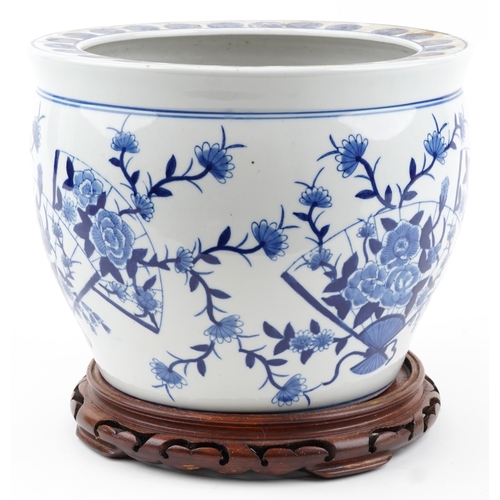 2439 - Chinese blue and white porcelain jardiniere on hardwood stand hand painted with flowers and fan moti... 