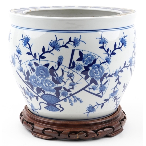 2439 - Chinese blue and white porcelain jardiniere on hardwood stand hand painted with flowers and fan moti... 