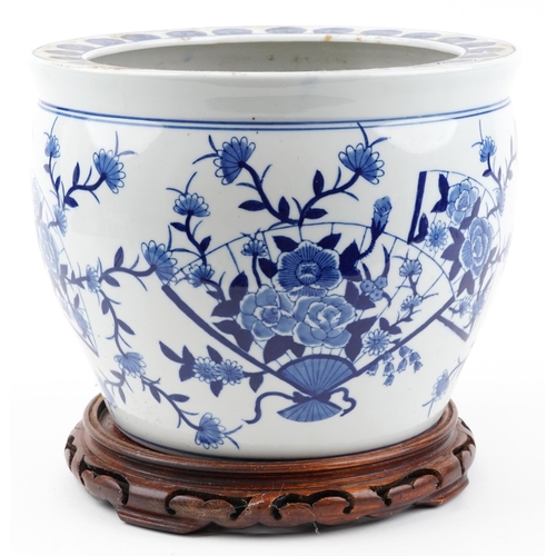 2439 - Chinese blue and white porcelain jardiniere on hardwood stand hand painted with flowers and fan moti... 