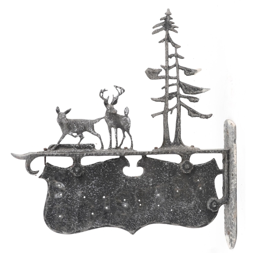 2661 - Cast metal wall sign with two deer and trees, 45cm deer