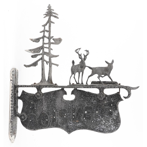 2661 - Cast metal wall sign with two deer and trees, 45cm deer