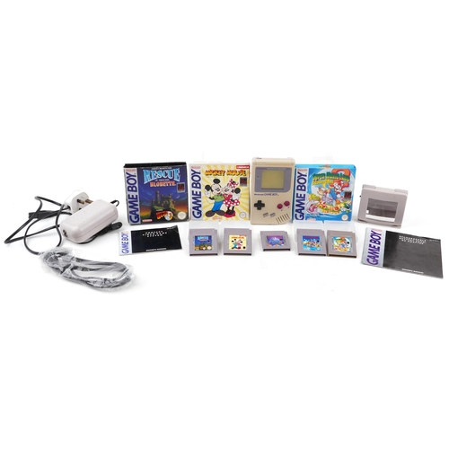 1175 - Vintage Nintendo Game Boy Advance with accessories and three games comprising Mickey Mouse, Super Ma... 