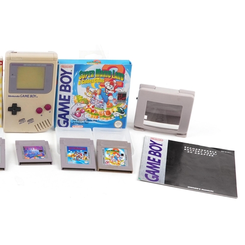 1175 - Vintage Nintendo Game Boy Advance with accessories and three games comprising Mickey Mouse, Super Ma... 