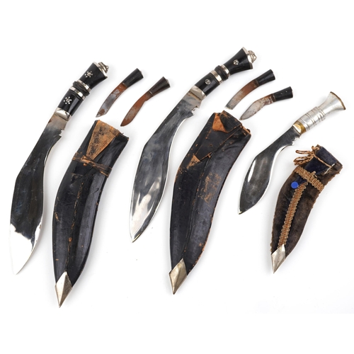 1421 - Three military interest Gurkha's kukri knives including one with beadwork sheath, the largest each 3... 