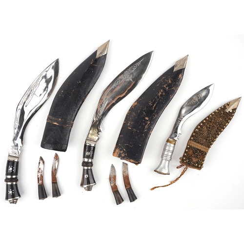 1421 - Three military interest Gurkha's kukri knives including one with beadwork sheath, the largest each 3... 