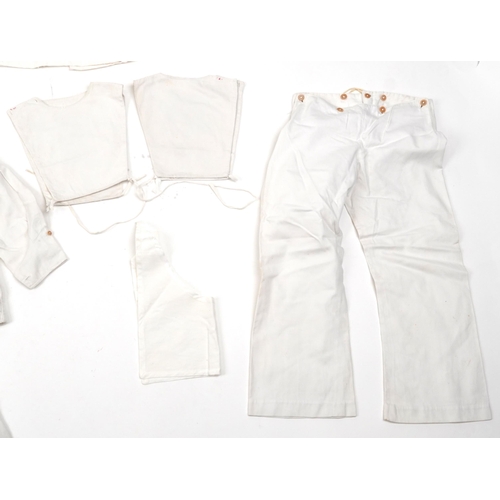 1087 - Early 20th century and later children's clothing including Peter Robinson Ltd Naval type smock and a... 