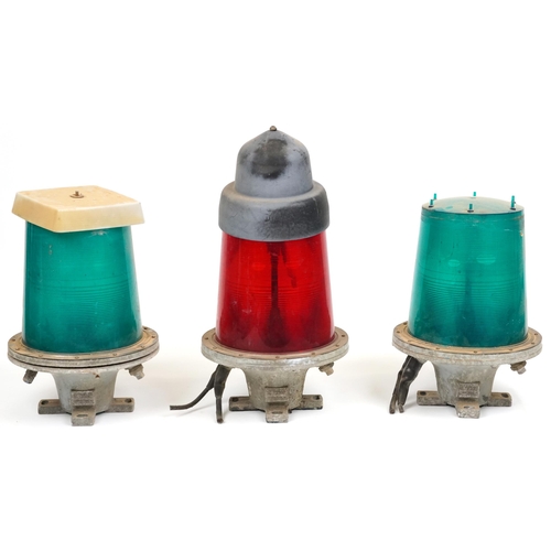 2318 - Automatic Power Inc, three American marine lanterns, models FA250DC-HW/FV, the largest 73cm high